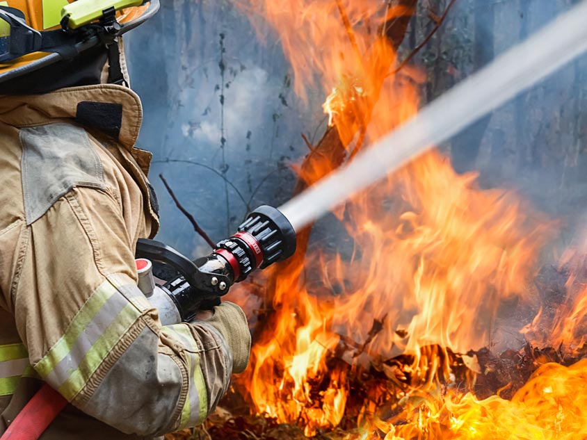 A firefighter fighting a fire
